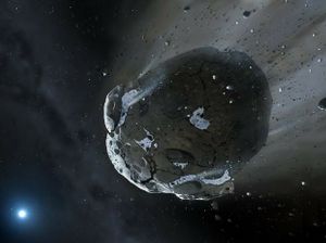 Impressão artística mostra asteroide rico em pedras e água sendo despedaçado pela forte gravidade da estrela anã branca GD 61: essa é a primeira vez que água é encontrada além do Sistema Solar