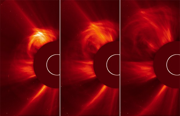 Sol é bloqueado por 'disco' nas imagens acima, para dar uma melhor noção da erupção ocorrida na 'atmosfera' da estrela, a chamada coroa. Uma ejeção de massa foi registrada nesta sexta-feira (15) (Foto: Divulgação/ESA/Nasa/Soho)