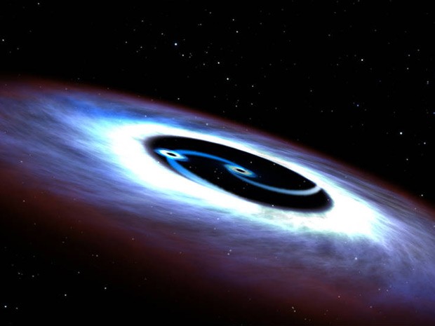 Ilustração mostra o duplo buraco negro observado no centro do quasar mais próximo da Terra, o Markarian 231. (Foto: NASA, ESA, and G. Bacon (STScI))