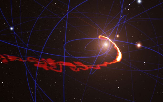 Imagem é uma simulação que mostra nuvem de gás descoberta em 2011 passando perto do buraco negro no centro da galáxia. (Foto: ESO/S. Gillessen/MPE/Marc Schartmann/Divulgação)