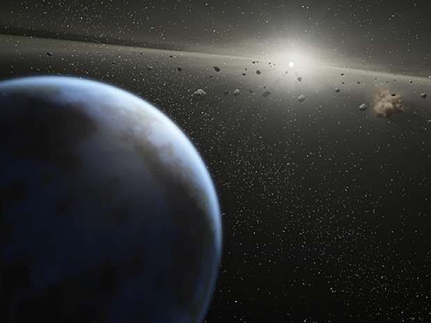 Concepção artística mostra cinturão massivo de asteroides ao redor de estrela da mesma idade e tamanho do Sol (Foto: Nasa/JPL-Caltech/T. Pyle (SSC) )