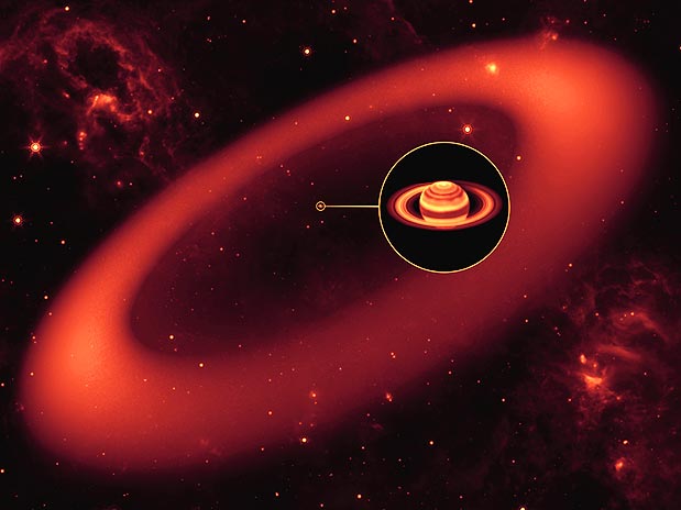 O Telescópio Espacial Spitzer detectou um anel gigante e quase invisível em torno de Saturno . Foto: Nasa/Divulgação